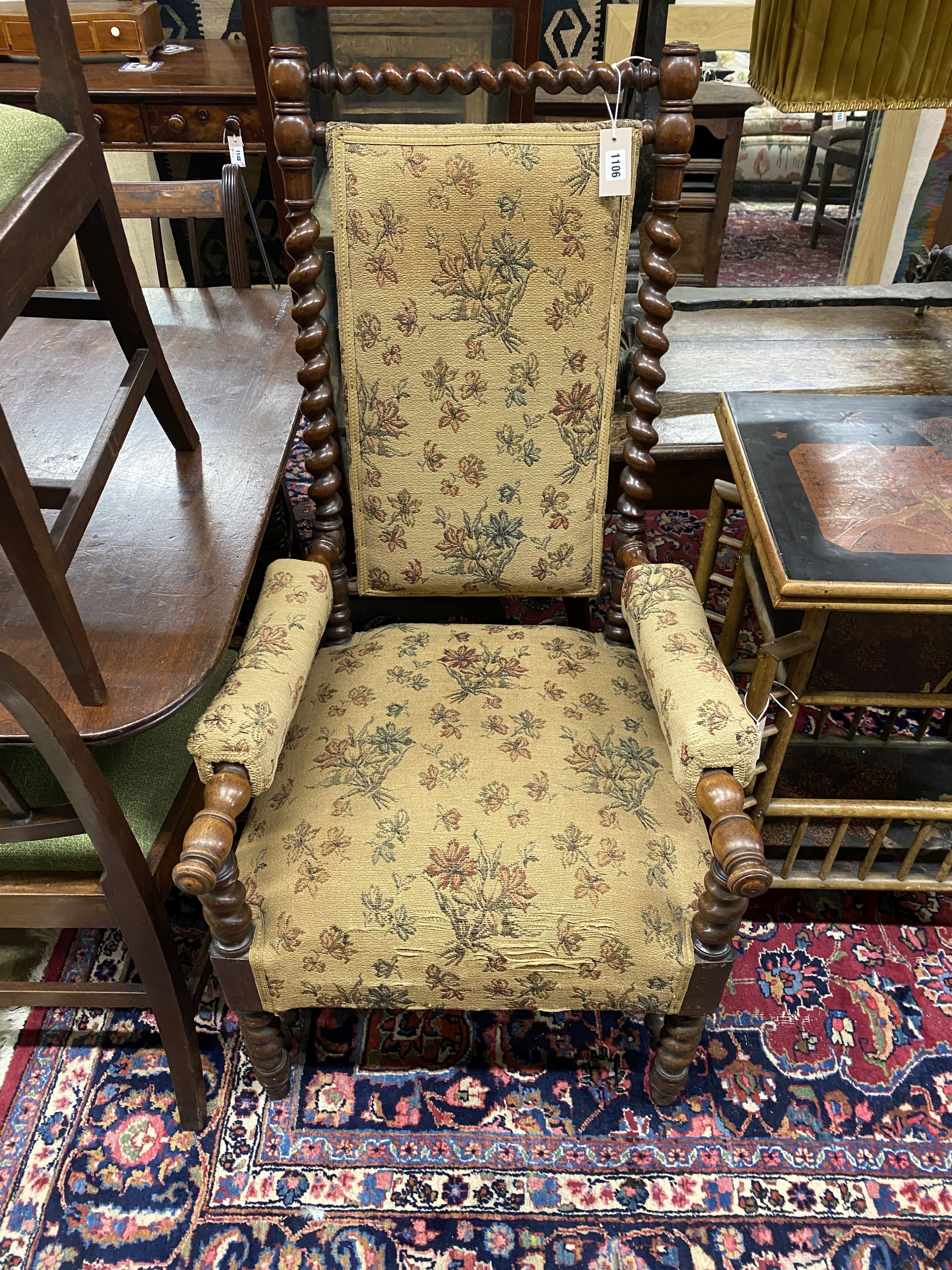 A Victorian spiral turned upholstered open armchair, width 60cm, depth 58cm, height 117cm